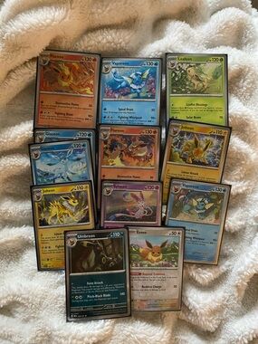Large Lot of Pokémon Prismatic Evolutions Cards